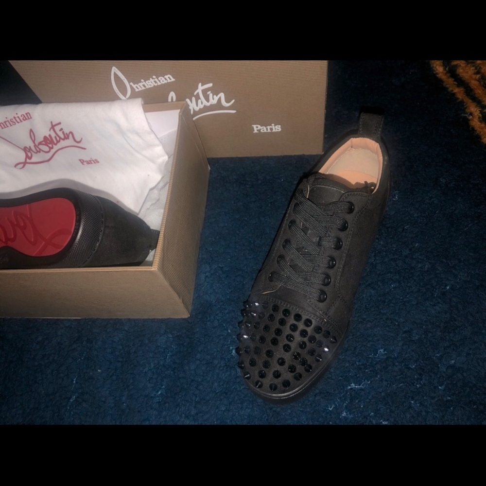 Christian Louboutin sneakers size 10.5. Brand new only worn them once to prom